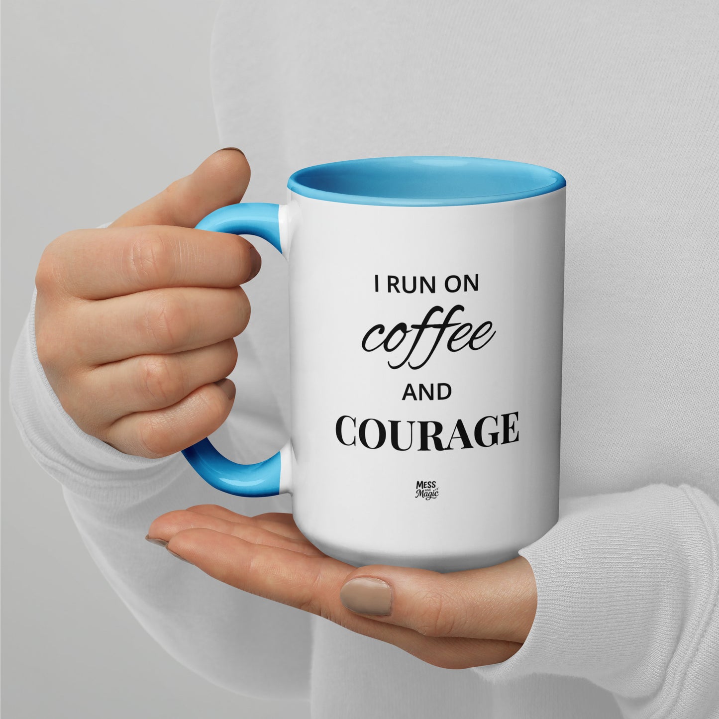 "I run on coffee and courage" mug